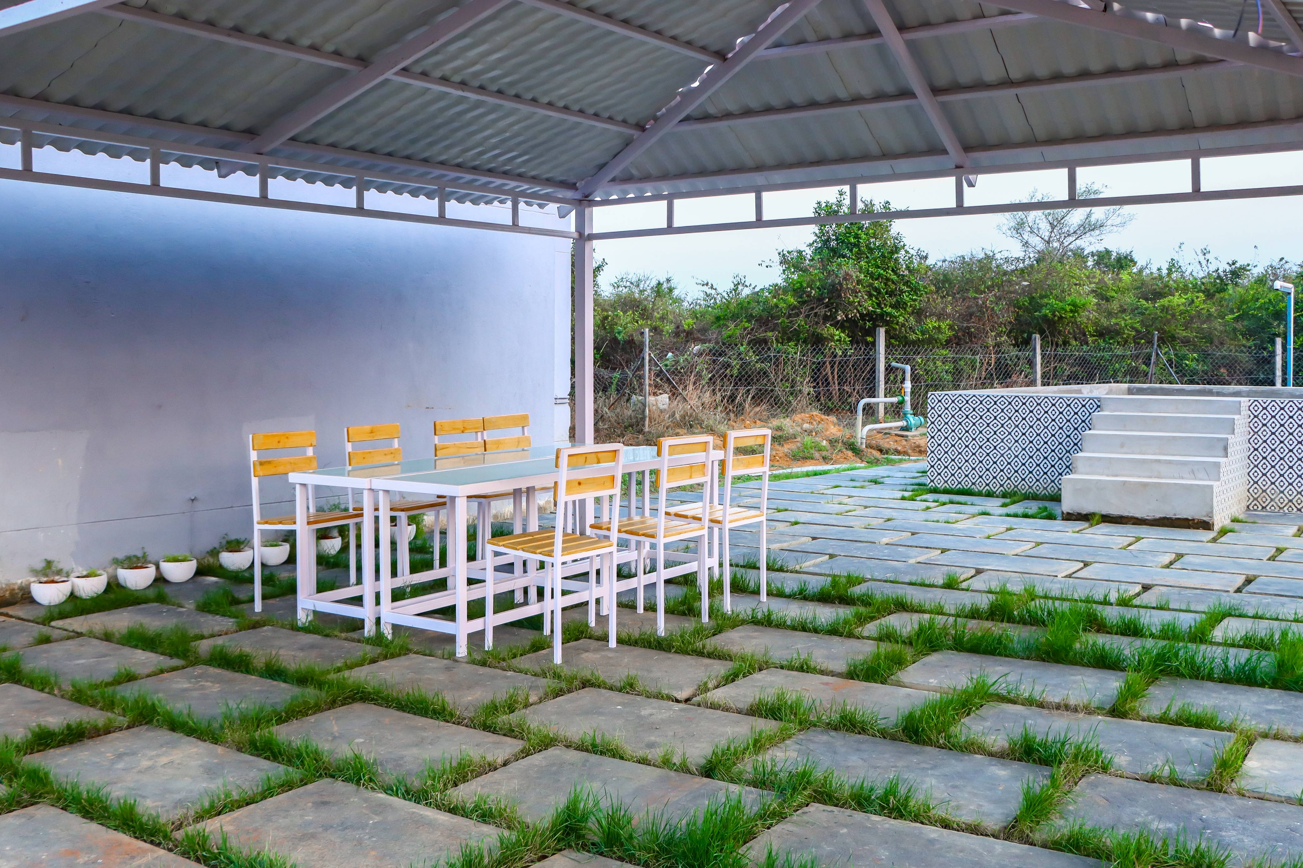 Farm animals grazing in green pasture